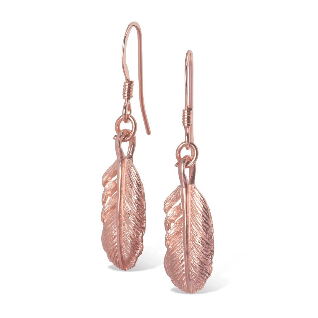 feather earrings in rose gold on a white background