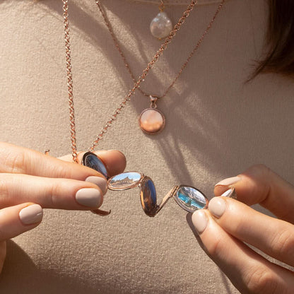 model wearing rose gold belcher chain with rose gold memory keeper locket 