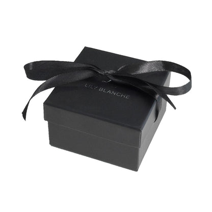 black ribobn-tied Lily Blanche gift box on a white background 