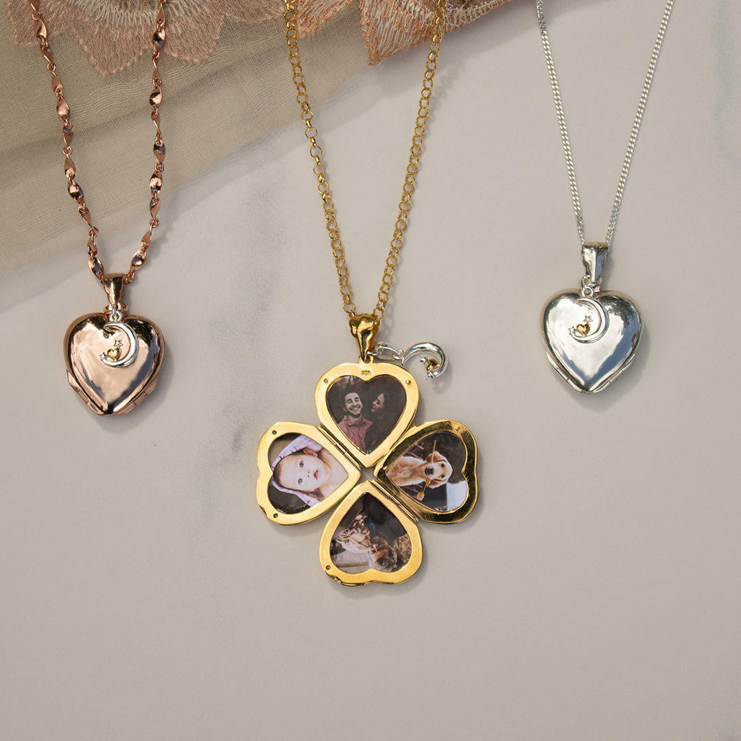 closed rose gold and silver heart lockets and an opened gold heart locket on table