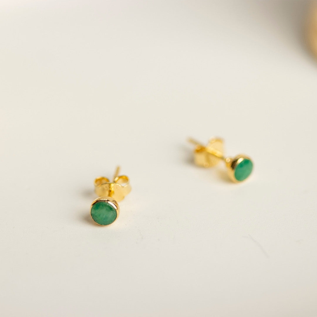 Lily Blanche gold mini stud earrings with emerald gemstone