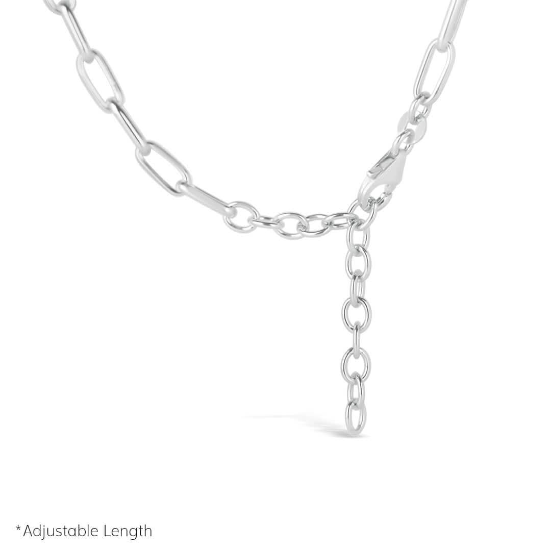 close up of adjustable paperclip chain necklace ion a white background