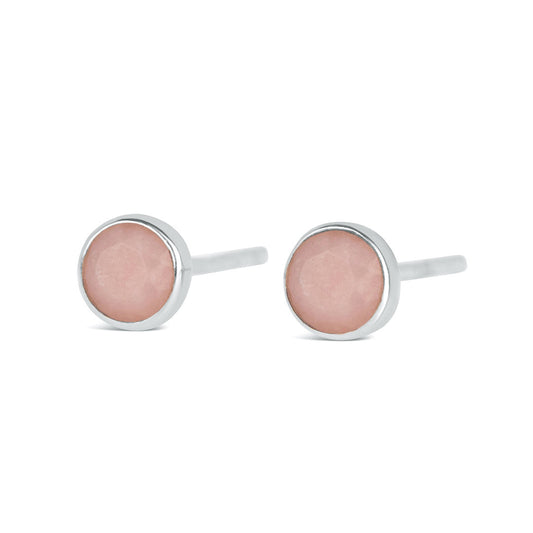 Pink opal stud earrings in silver facing the front on a white background