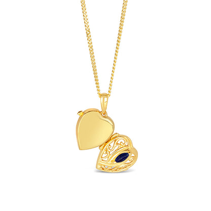 opened sapphire heart locket in gold showing back and front of locket