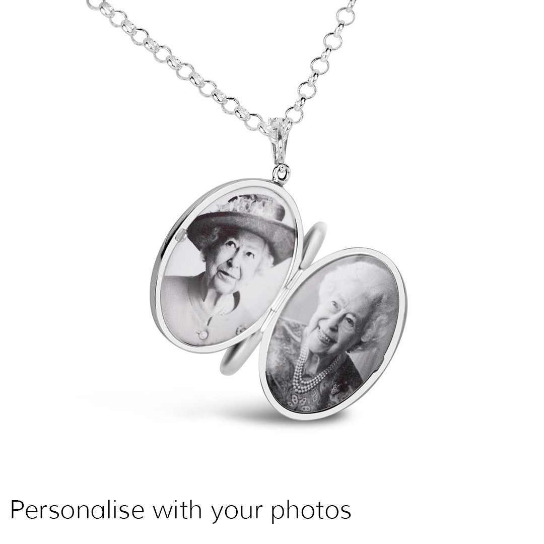 opened Queen Elizabeth four photo locket on a white background