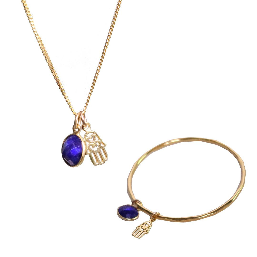 rose gold sapphire charm bangle and necklace with hamsa hands symbol 