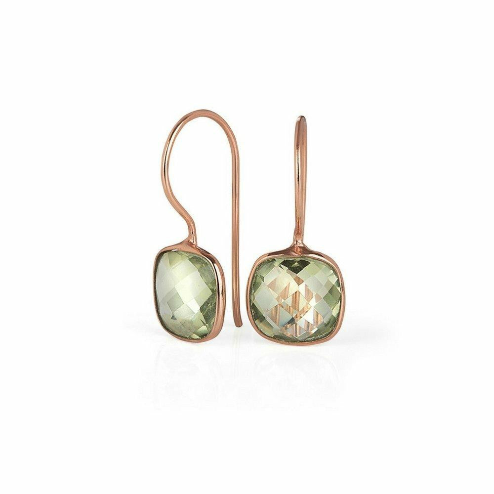 green amethyst cocktail ring in rose gold on a white background