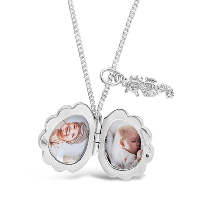 inside white gold shell locket and silver seahorse charm with 2 photos fitted