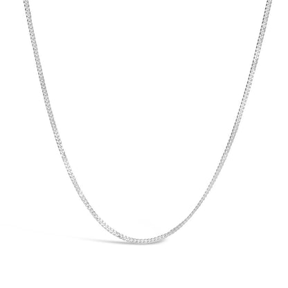 white gold curb chain on a white background