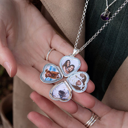 model holding white gold heart shaped locket with four photos