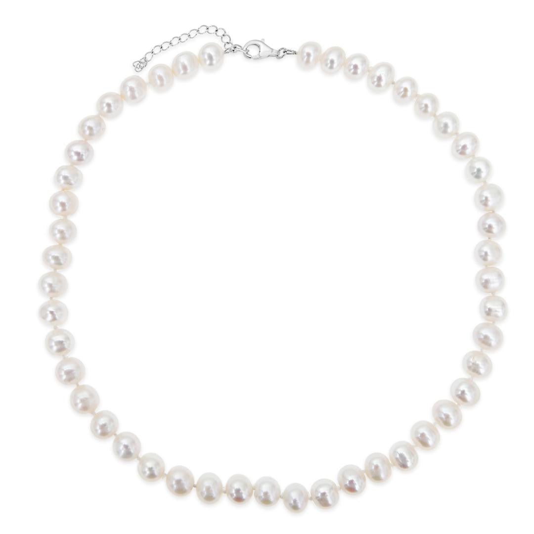 classic pearl necklace in ivory on a white background