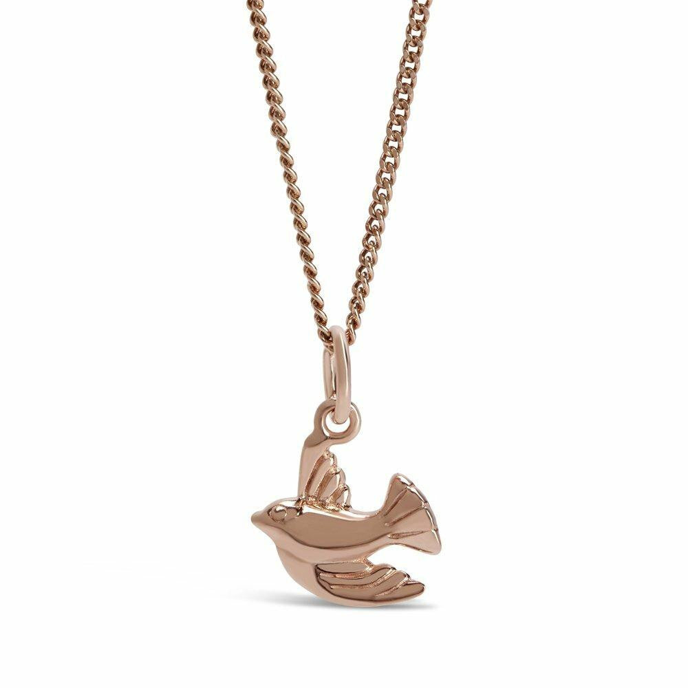 bird pendant in rose gold on a white background