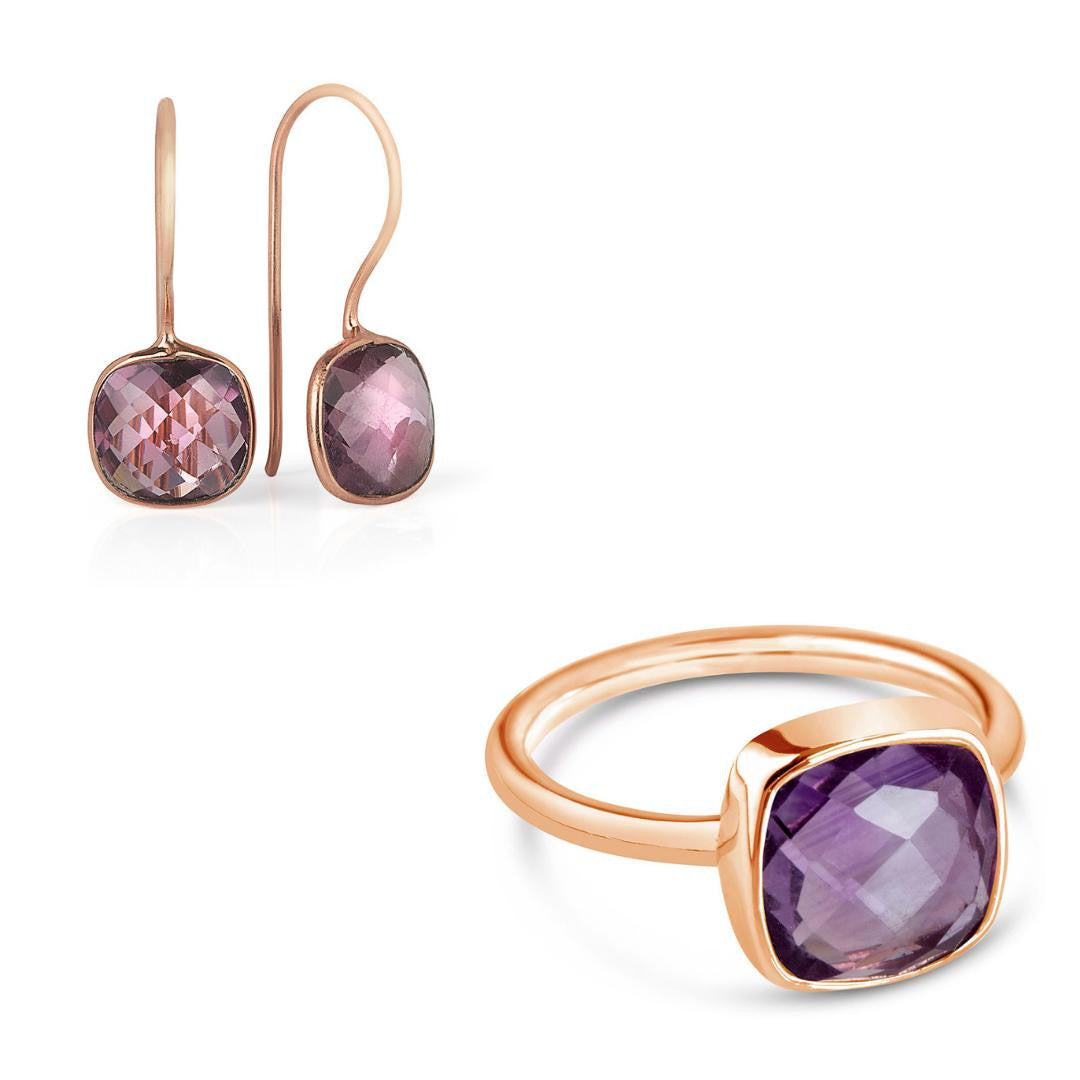 purple amethyst cocktail ring and matching earrings in rose gold on a white background