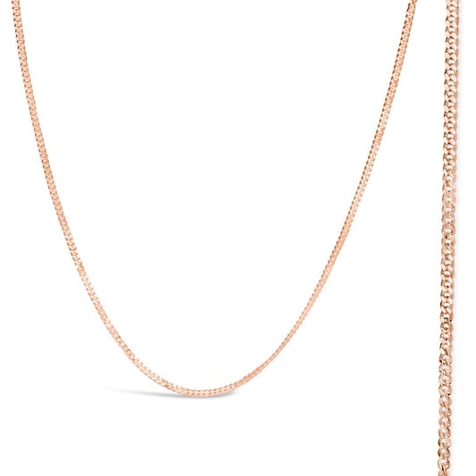 rose gold curb chain on a white background