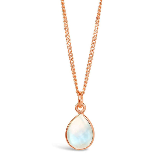 moonstone charm necklace in rose gold on a white background 