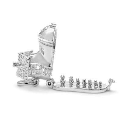 opened magical shoe charm in silver on a white background