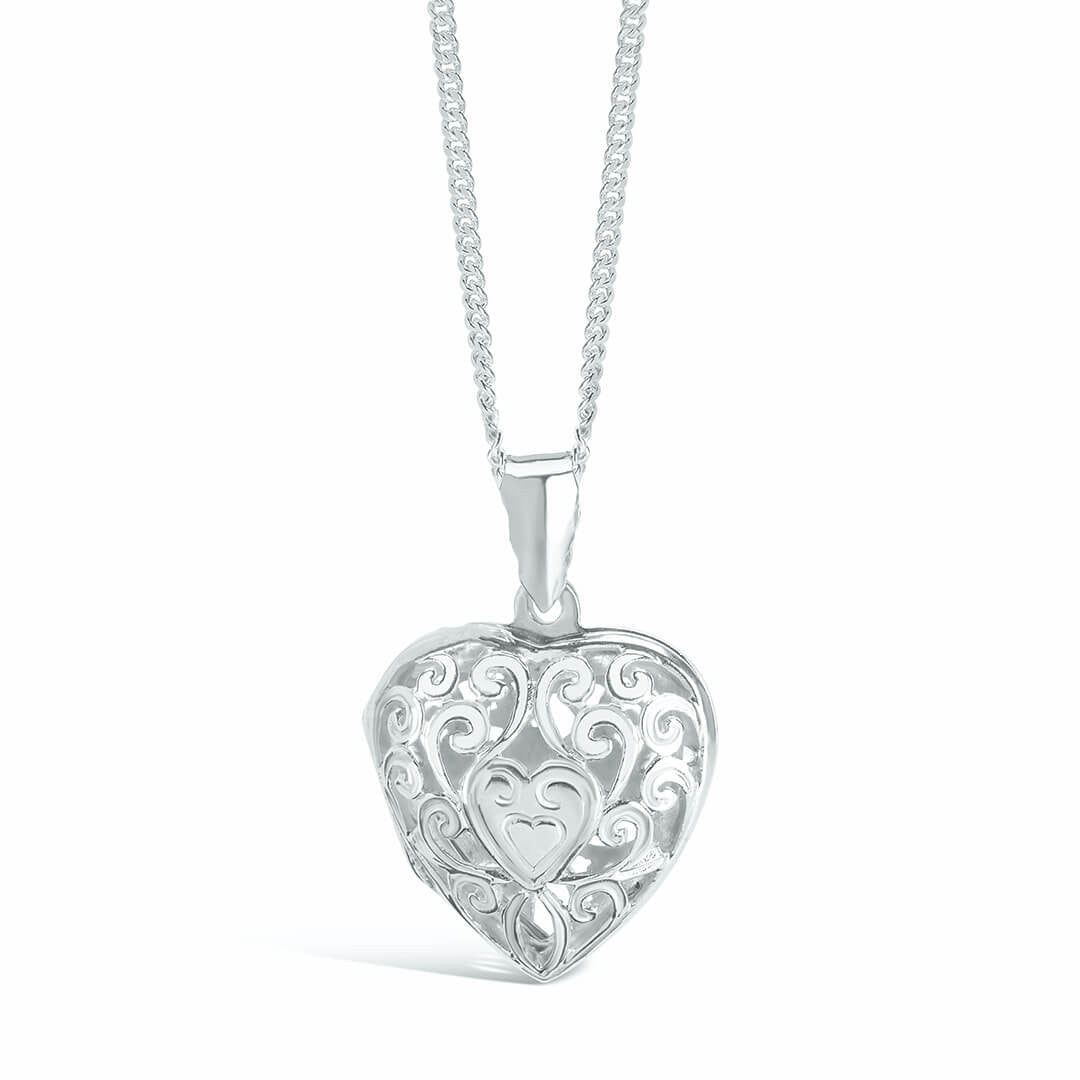 heart locket necklace in silver on a white background