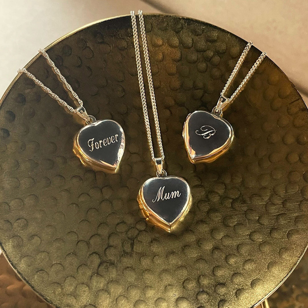 three secret silver heart lockets engraved with messages