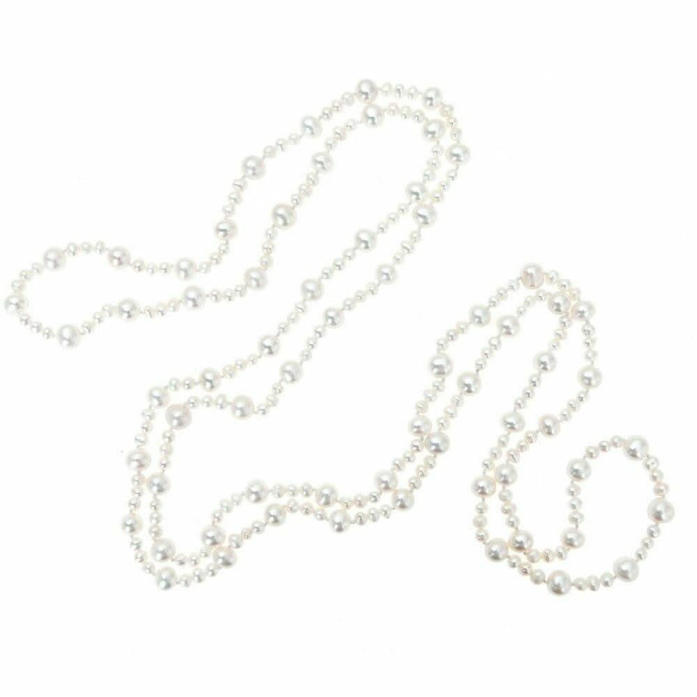 eternal pearl necklace in ivory on a white background