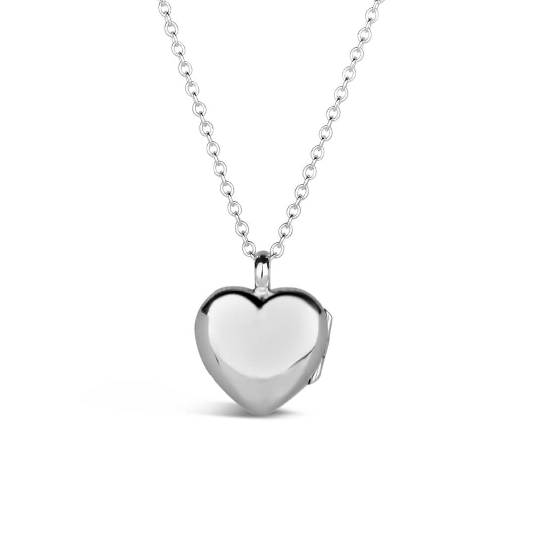 heart shaped locket in silver on a white background from a back perspective