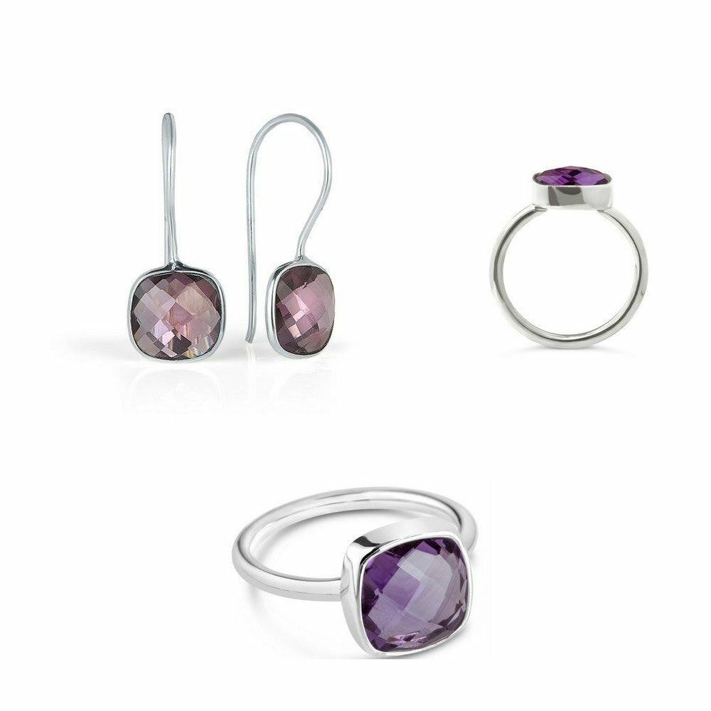 purple amethyst earrings in silver with matching cocktail ring on a white background