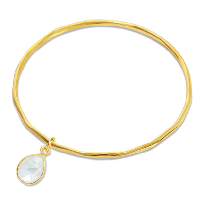 white quartz charm bangle in gold on a white background