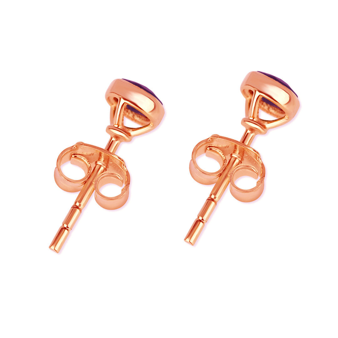 Pink opal mini stud earrings in rose gold facing the back on a white background
