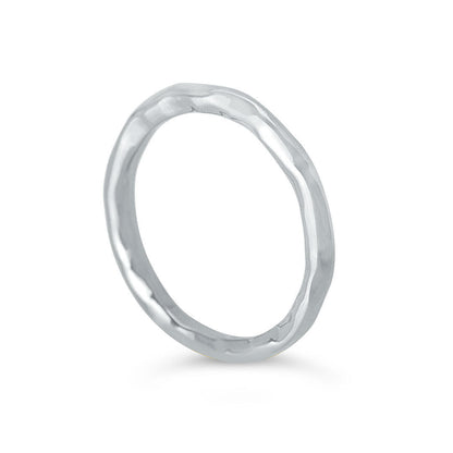 silver friendship band ring on a white background