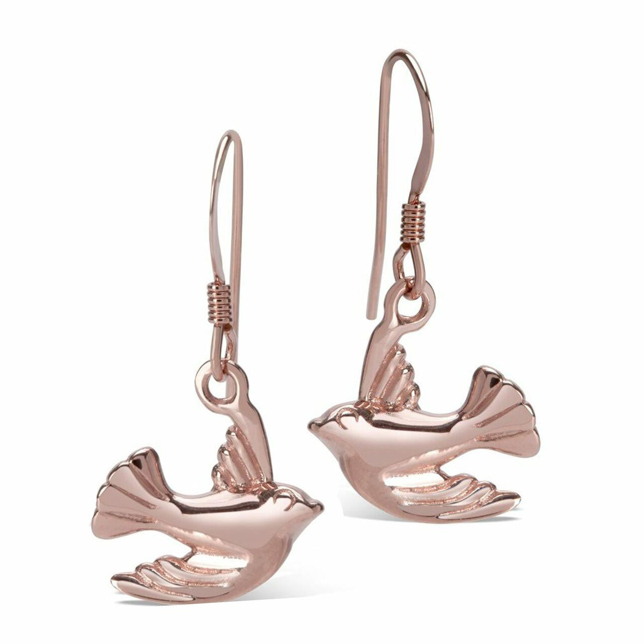 bird earrings in rose gold on a white background