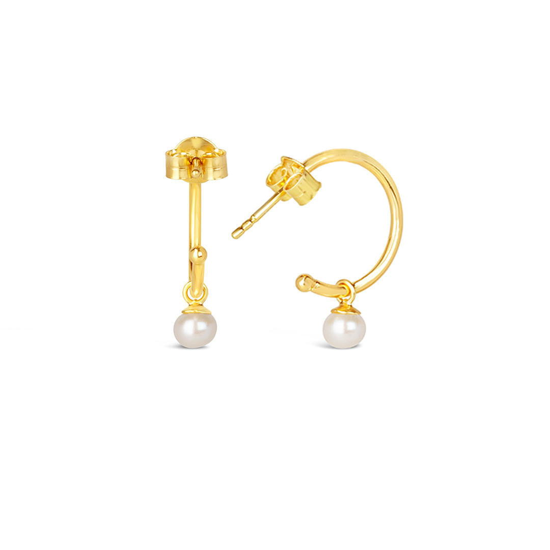 dainty pearl drop hoop earrings in gold ivory on a white background