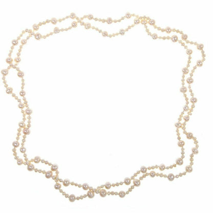 eternal pearl necklace in champagne on a white background 