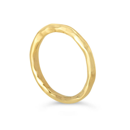 men's hammered gold ring on a white background