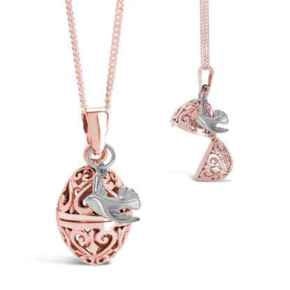 bird locket in rose gold with silver bird charm on a white background