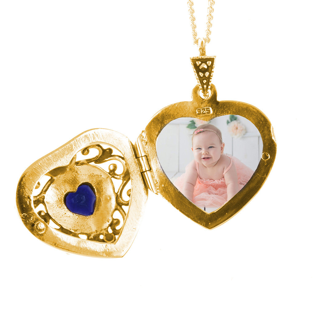 sapphire vintage heart locket in gold with photo of baby on inside