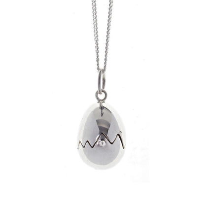 charming chick locket in silver on a white background