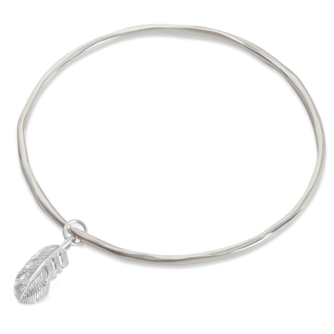 silver bangle with silver feather charm attached 