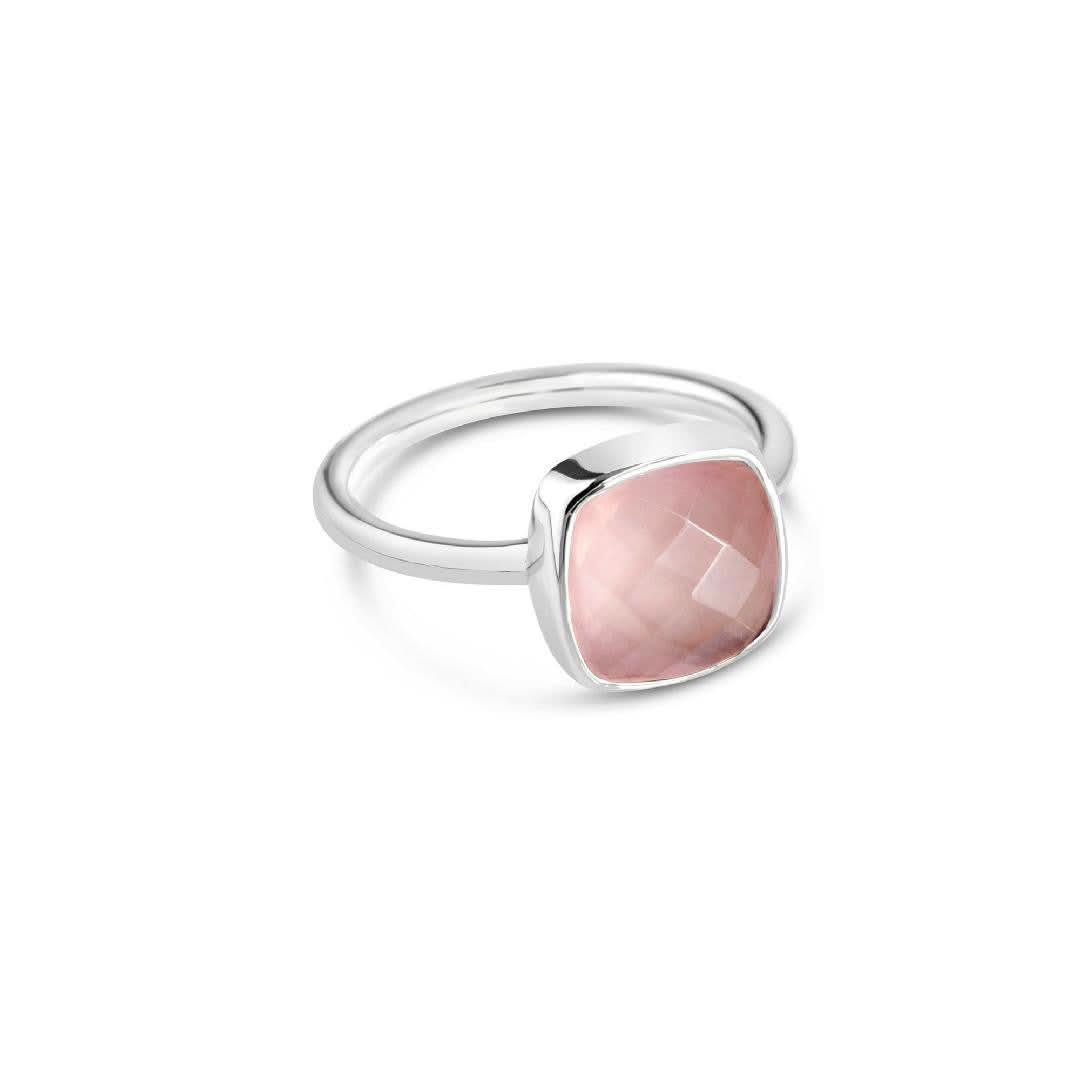 rose quartz cocktail ring in silver on a white background