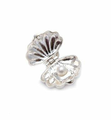 opened shell magical charm on a white background