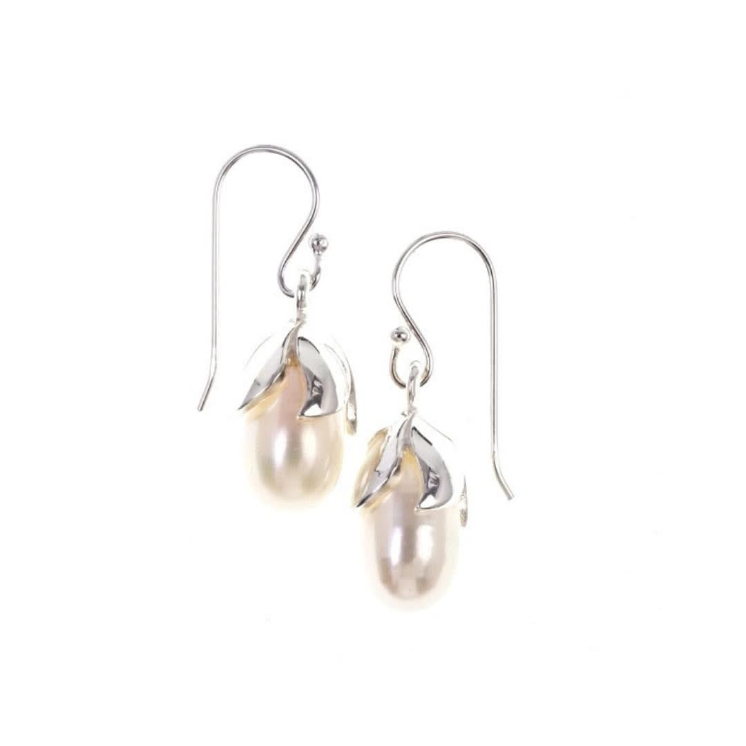 little pod earrings on a white background