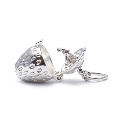 opened magical strawberry charm on a white background