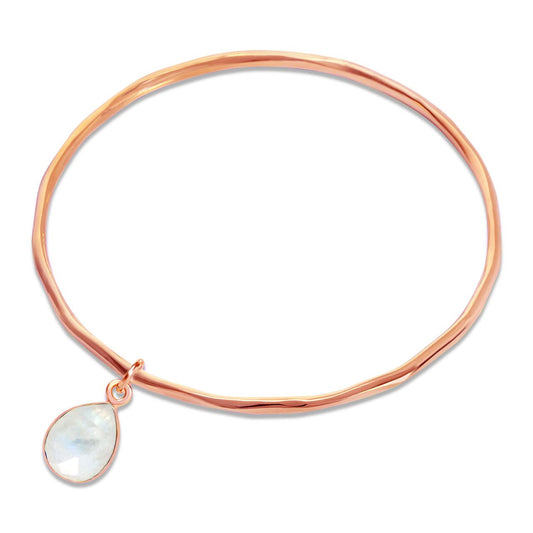 white quartz charm bangle in rose gold on a white background