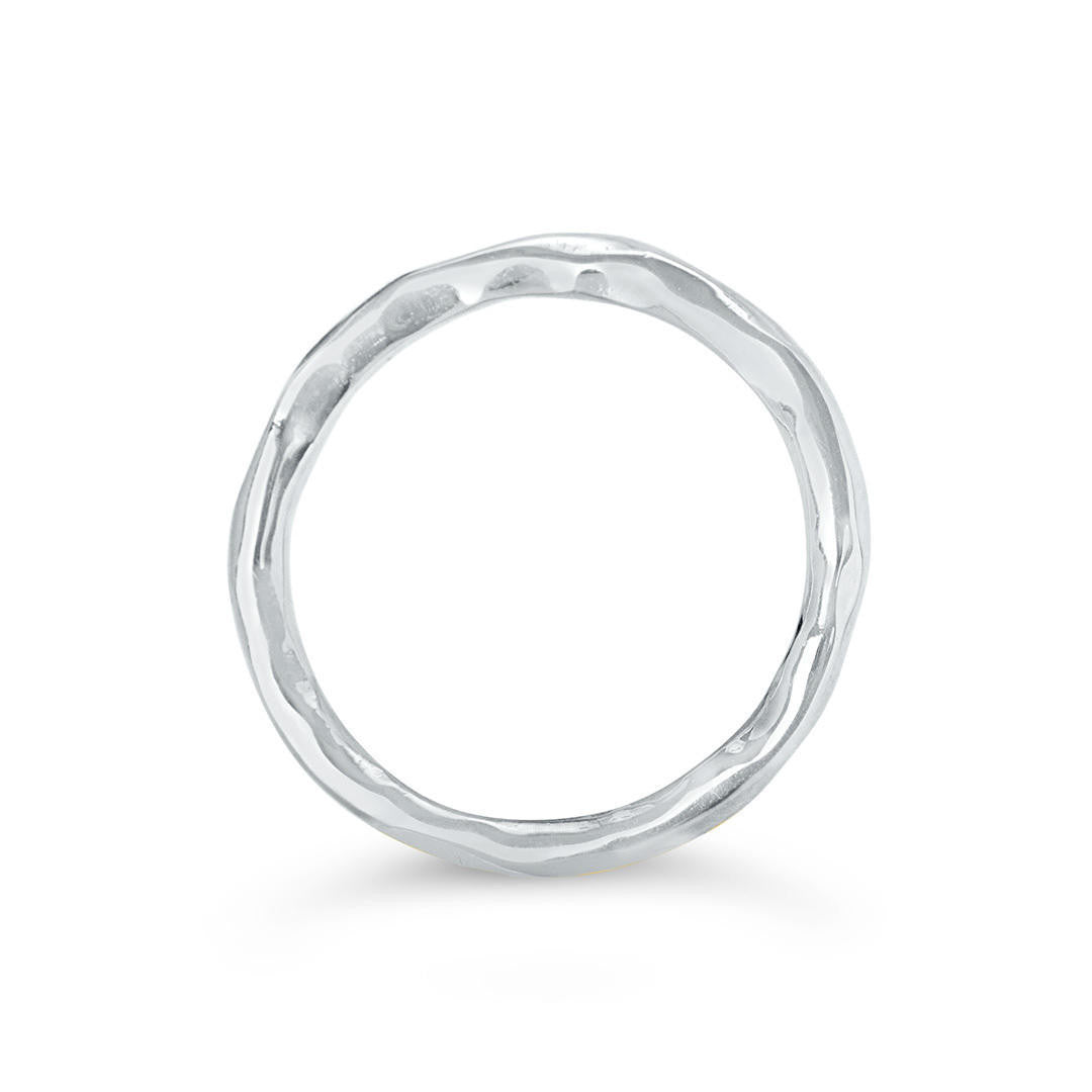silver friendship band ring on a white background
