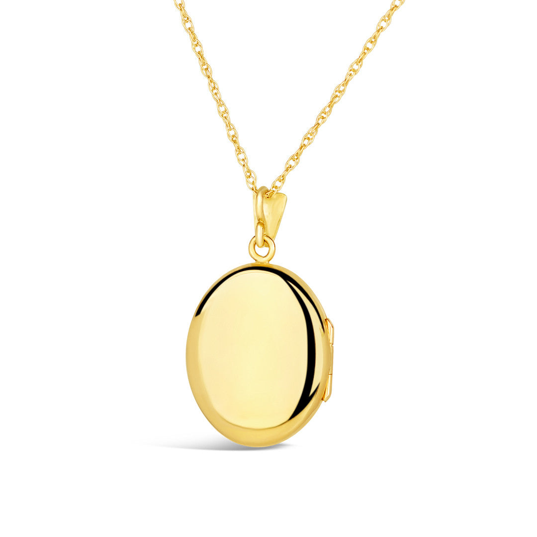 back of diamond oval locket in gold on a white background