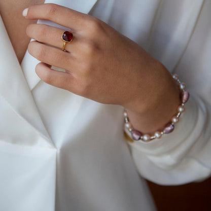 close up of model wearing dusk pearl heart bracelet