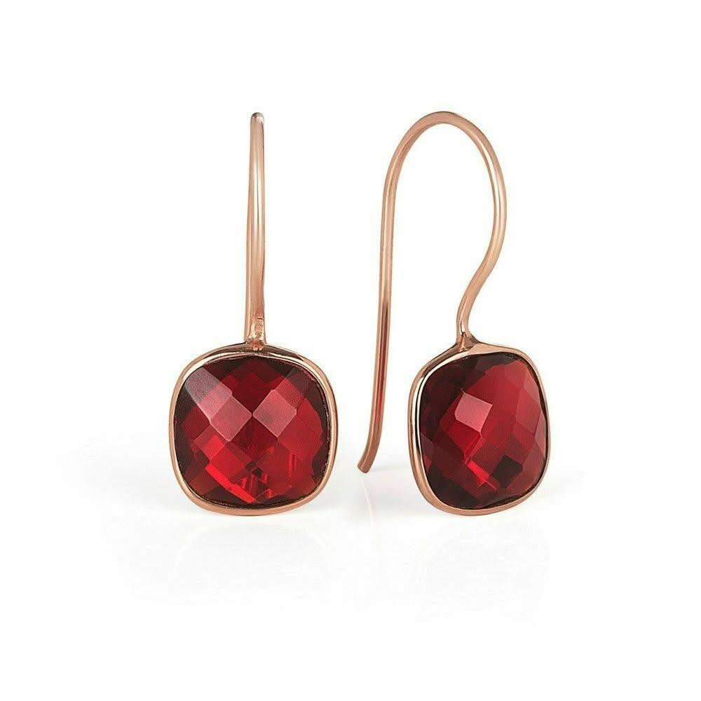 garnet earrings in rose gold on a white background