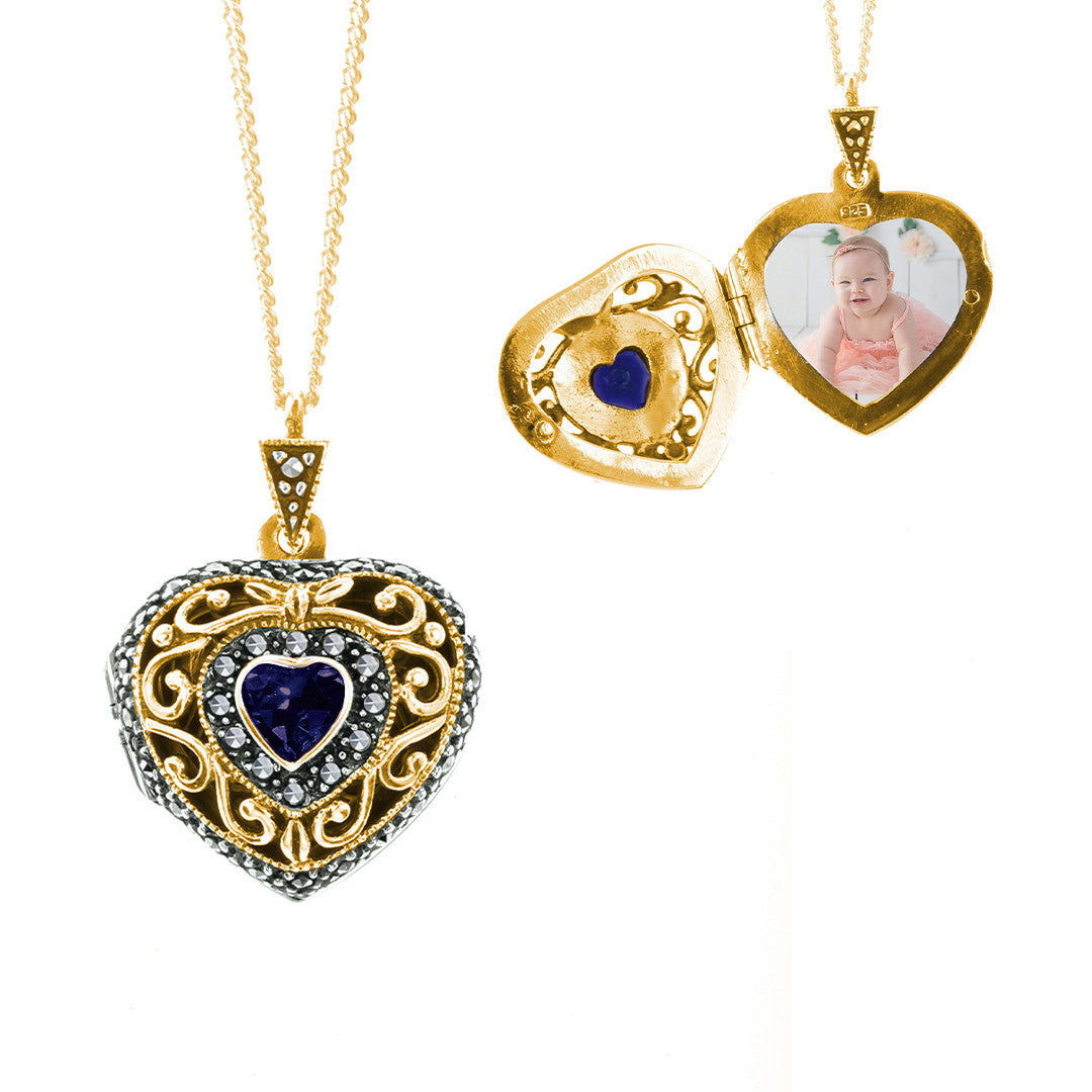 sapphire vintage heart locket in gold with opened and closed view on a white background