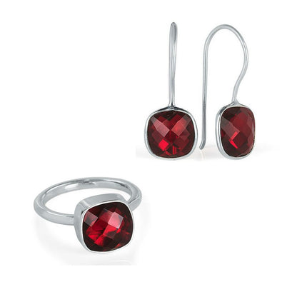 garnet earrings and cocktail ring on a white background