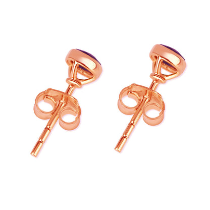 Sapphire mini stud earrings in rose gold facing the back on a white background