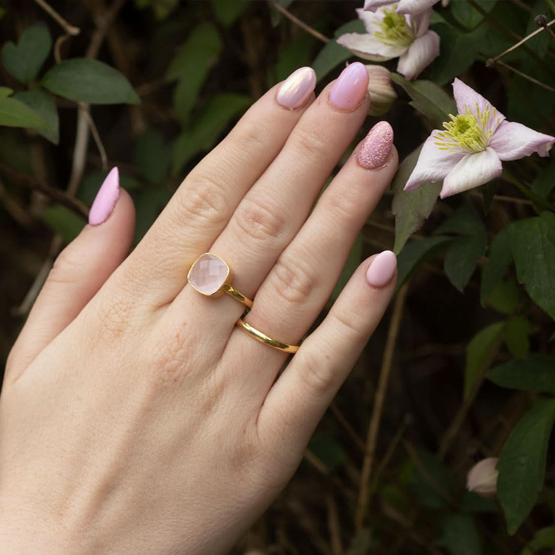 model wearing gold friendship band ring