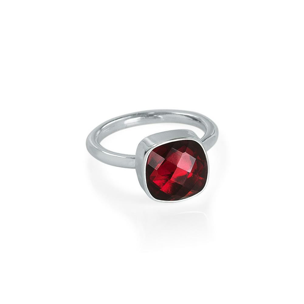 garnet cocktail ring in silver on a white background